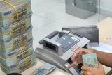 Chấn chỉnh việc tăng lãi suất huy động
