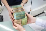 Lãi suất tiết kiệm giảm xuống gần 0% tại một ngân hàng